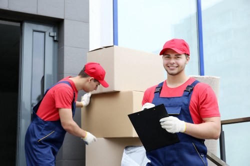 Professional office removals process in Westharrow with packed business equipment