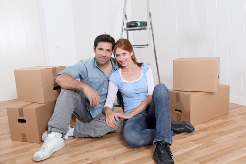 Packed boxes and furniture ready for short-term storage in Westharrow
