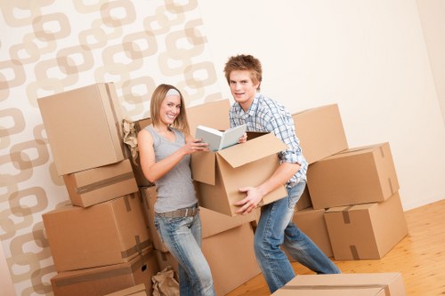 Removal van loading boxes for a flat move in Westharrow